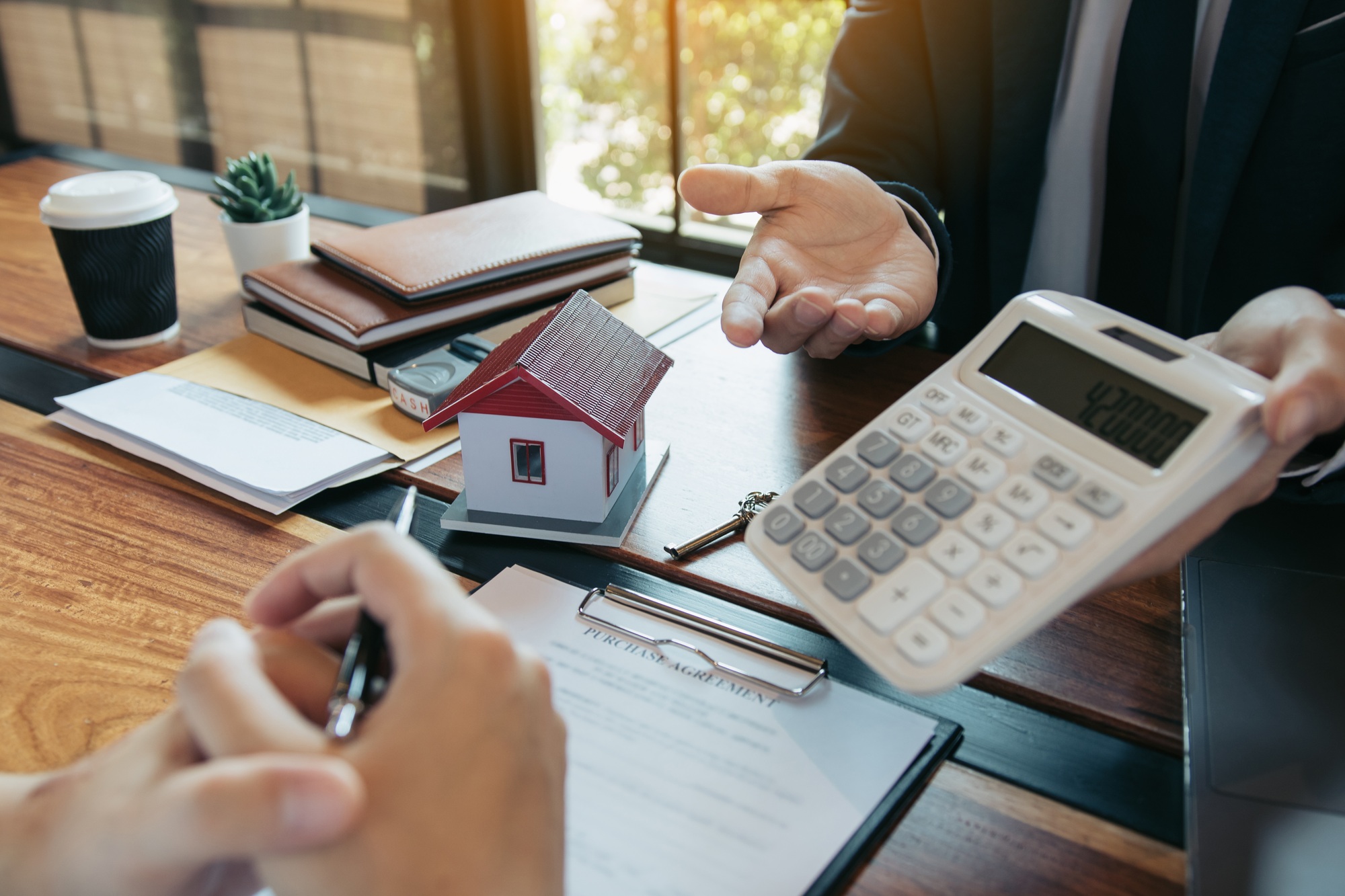 Agents are calculating the loan payment rate or the amount of insurance premiums